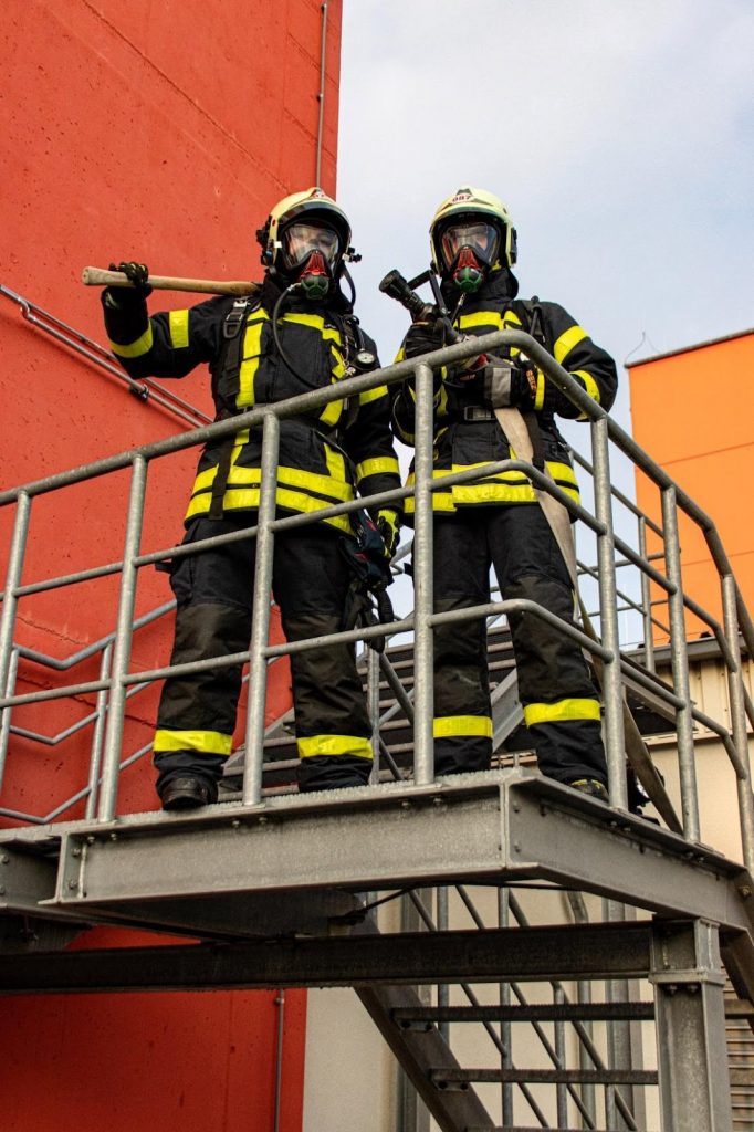 Protective apparel such as worn by these workers can be made of inherent or treated FR fabric